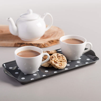 Melamine Dotty Sandwich Tray by Zeal holding tea and biscuits
