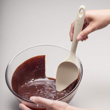 Using a Zeal Silicone Large Spatula Spoon to scrape a bowl
