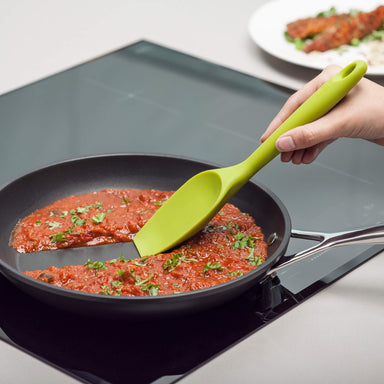 Using a Zeal Silicone Large Spatula Spoon to cook a tomato sauce