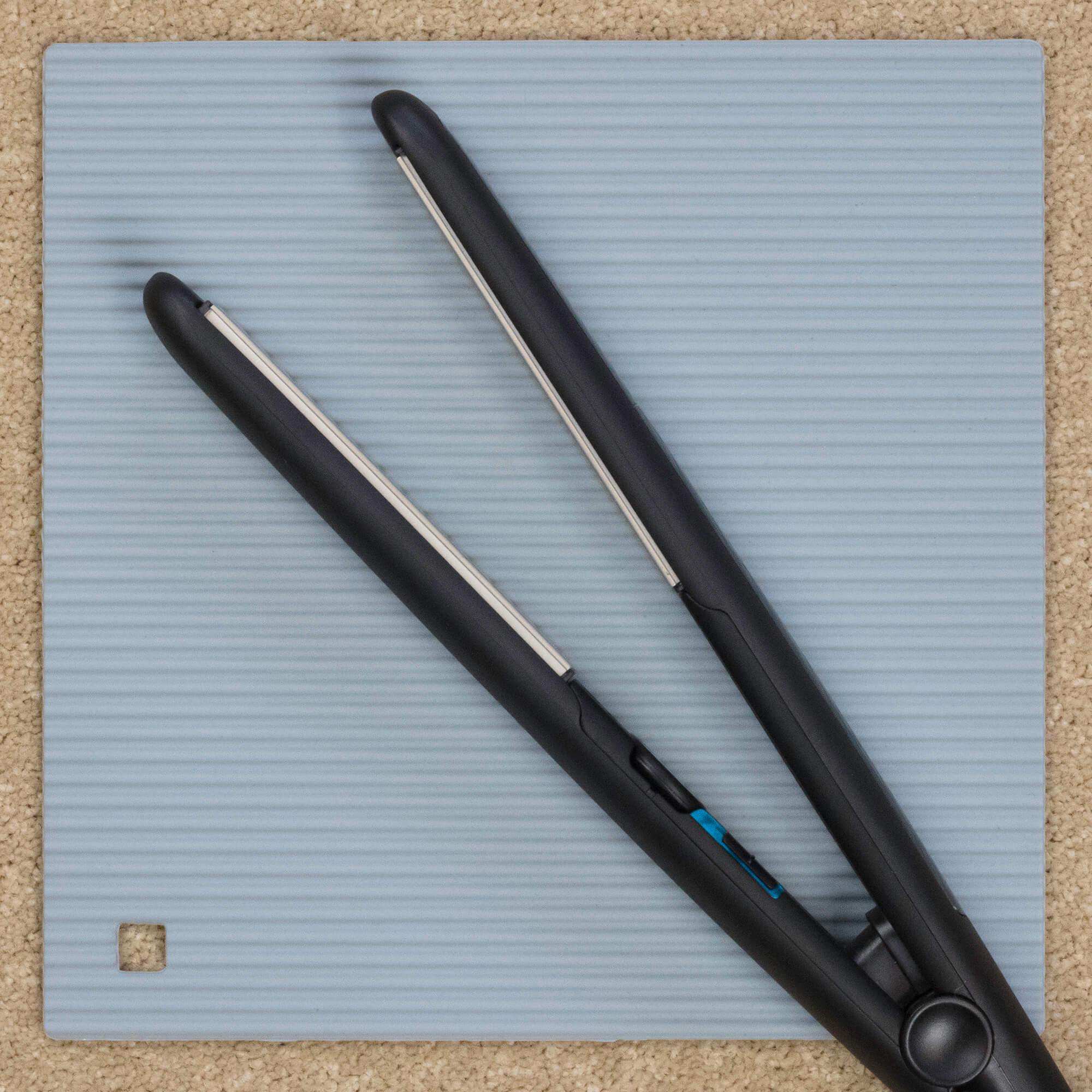 Using a Zeal Silicone Hot Mat to protect surfaces from hair straighteners