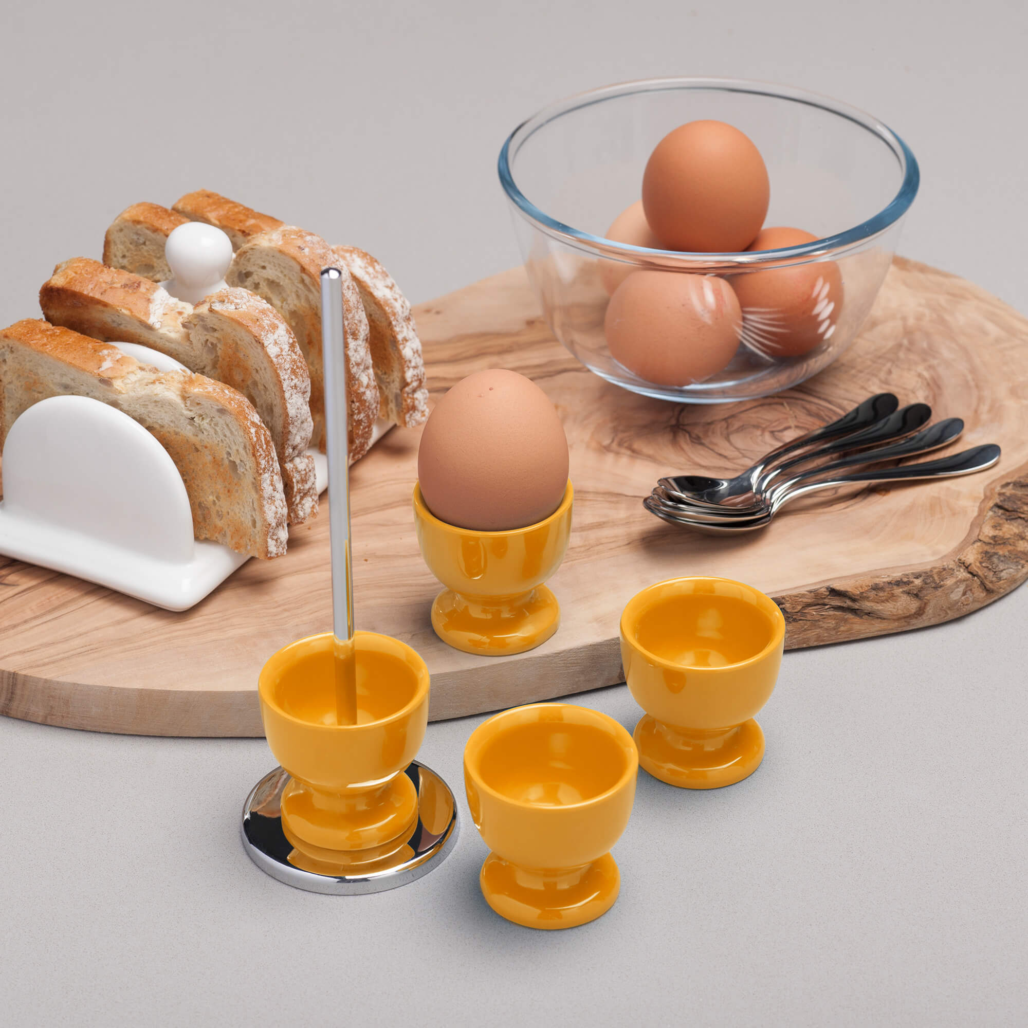 https://zealzeal.com/cdn/shop/products/zeal-g277_stacking-egg-cup-set-in-mustard_lifestyle_2000x2000.jpg?v=1643629588