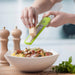 Using Zeal Parmesan Grater to grate cheese over tagliatelle 