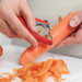 Peeling carrots with a Zeal Palm Fit Peeler