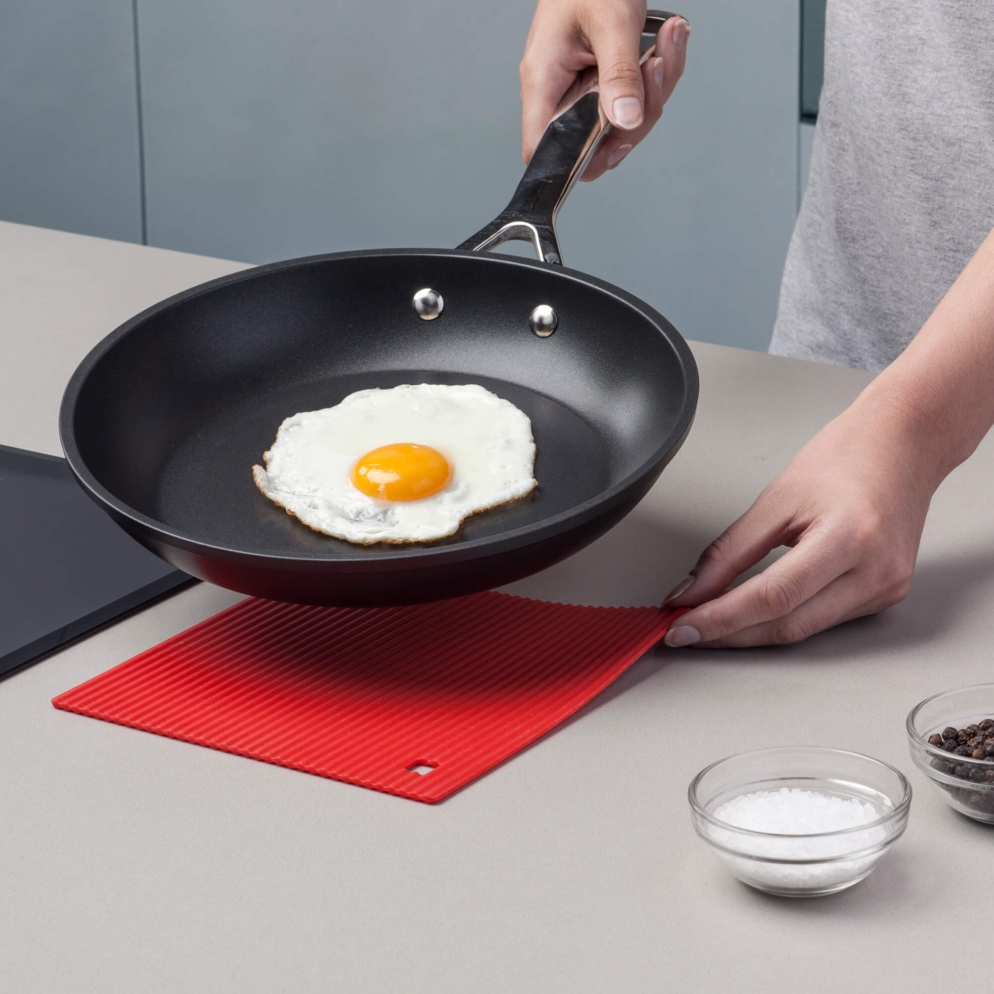 Zeal Silicone Hot Mat with a hot frying pan