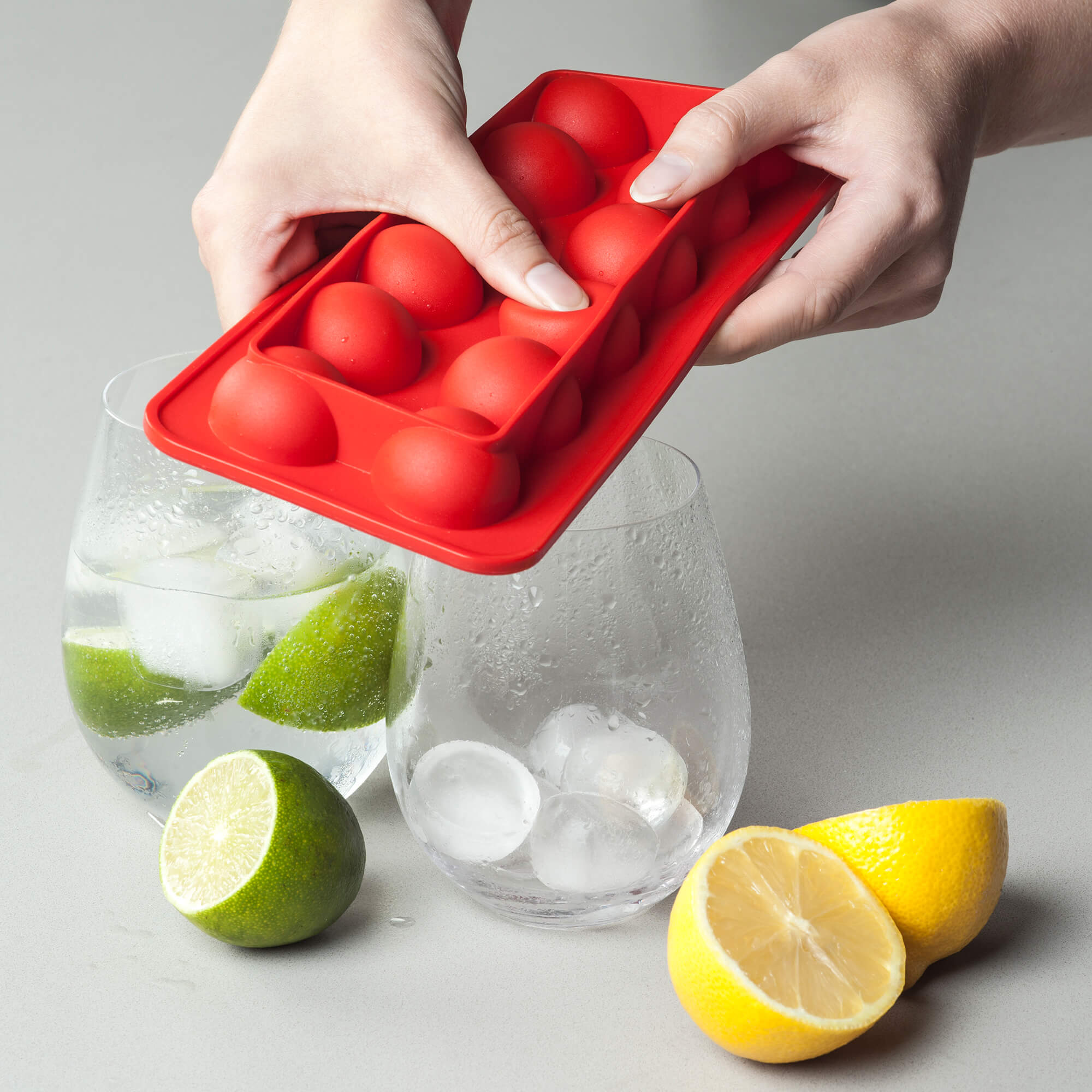 https://zealzeal.com/cdn/shop/products/zeal-j245_silicone-round-ice-cube-tray-in-red_in-use_2000x2000.jpg?v=1632556845