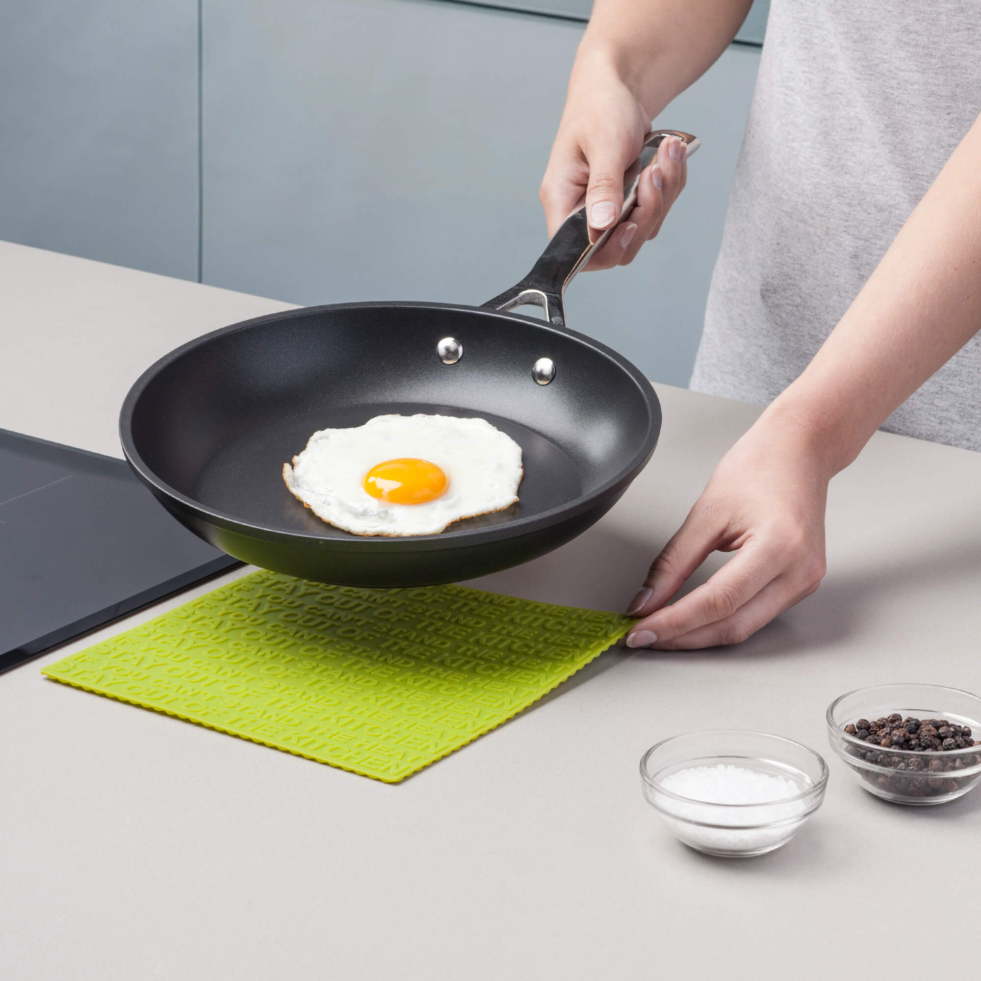 Zeal Silicone Hot Mat with a hot frying pan