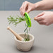 Zeal Herb Stripper in use with rosemary