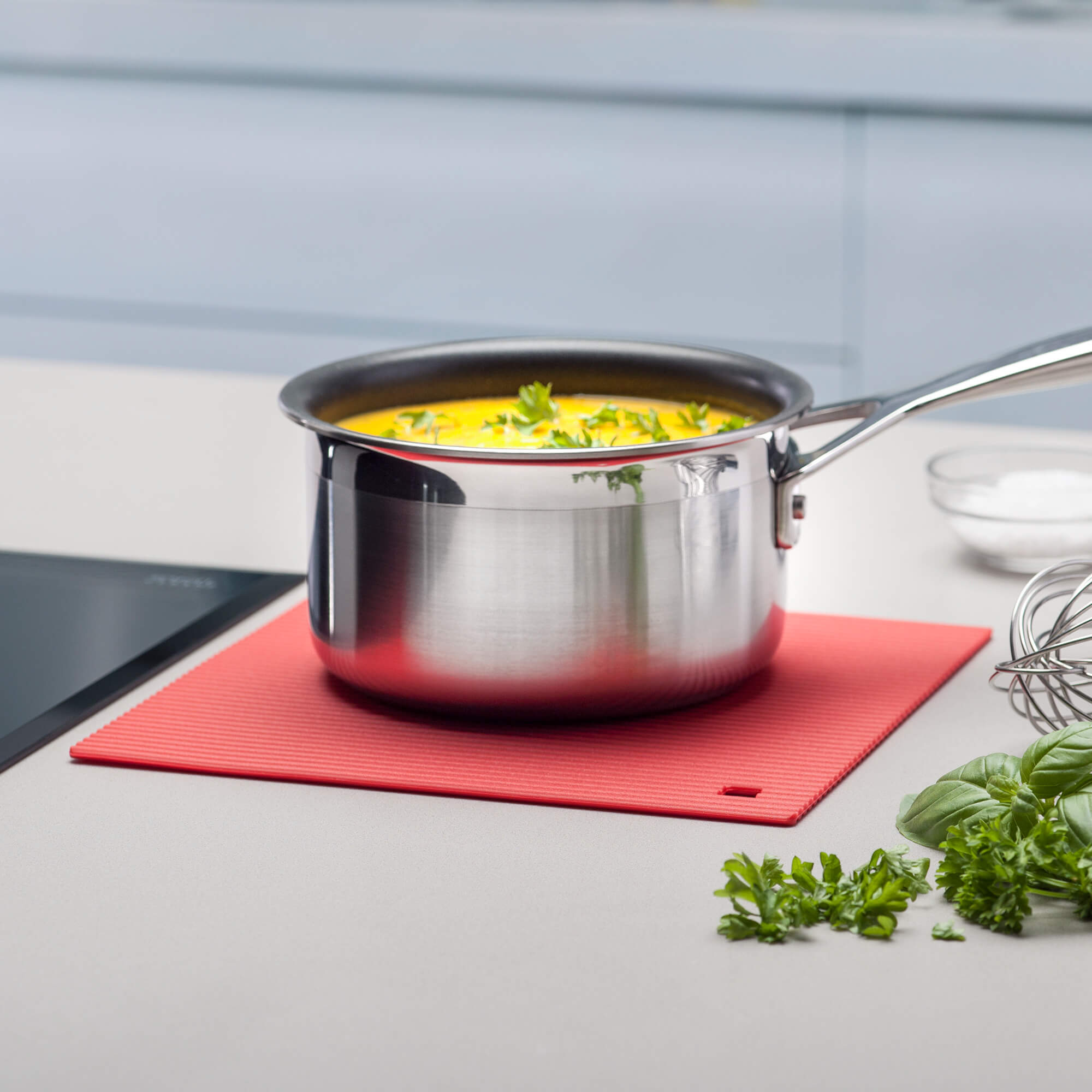 Zeal Silicone Hot Mat with a hot saucepan