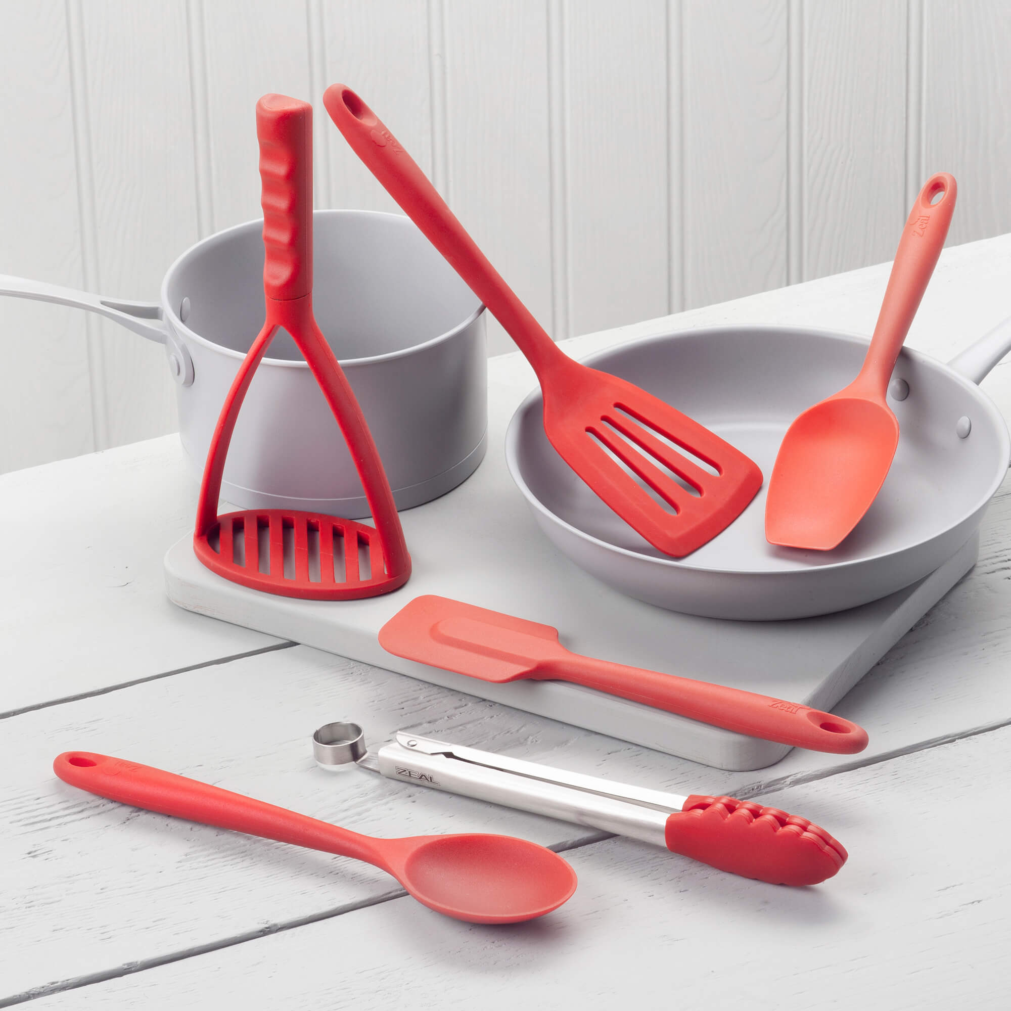 https://zealzeal.com/cdn/shop/products/zeal-jset-47_tongs-turner-fleximasher-spoon-and-spatulas-set-of-6-in-red_lifestyle_2000x2000.jpg?v=1626446056