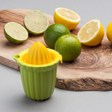 Fresh lemons and limes with a Zeal Citrus Juicer