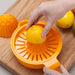 Zeal Easy Squeeze Juice Extractor squeezing lemons
