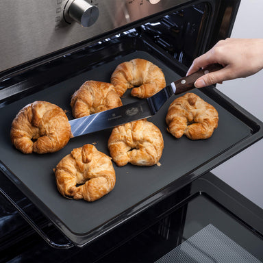 Zeal Non Stick Silicone Baking Sheet with freshly baked croissants