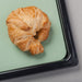 Zeal Non Stick Silicone Baking Sheet with a freshly baked croissant